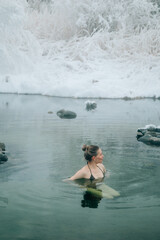 Woman relax in warm springs water