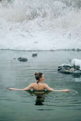 Woman relax in warm springs water