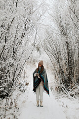 woman walking in forest 