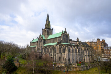 Fototapeta premium Nice view of Glasglow Cathedral from Glasgow Necropolis , The oldest cathedral church in mainland Scotland during winter sunny day at Glasgow , Scotland : 27 February 2018