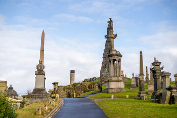 Fototapeta na wymiar The Glasgow Necropolis , Nice view and sculpture of Victorian Cemetery Monuments during winter sunny day at Glasgow , Scotland : 27 February 2018