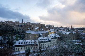 Fototapeta premium View of Edinburgh old towns around Dean Bridge & Rhema Christian Centre Church during winter snow evening at Edinburgh , Scotland : 27 February 2018