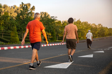 Senior people  exercise walking  at public park healthy  lifestyle  concept.