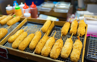 Thai street food in temple fair, and night local markets in Bangkok. Asian Retail shops. Travel in Thailand.