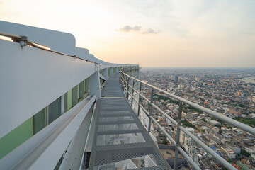 Empty space with sky park on private rooftop terrace of condominium or hotel, high rise architecture building with urban city  town, Bangkok, Thailand.