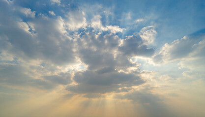Sunset sky. Abstract nature background. Dramatic blue with orange colorful clouds in twilight time.
