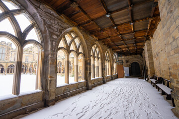 Durham Cathedral Cloister and Path , Unesco Historic Gothic and Romanesque church during winter snow morning in Durham , United Kingdom : 1 March 2018
