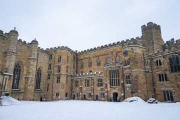 Durham Castle near Durham Cathedral and University Library during winter snow morning at Durham , United Kingdom : 1 March 2018