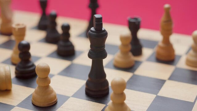 Man making a chess move. King capturing another king. Chessboard. Close up