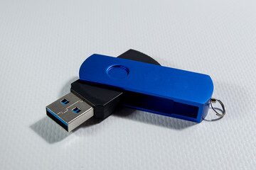 Bright blue USB drive isolated on white background