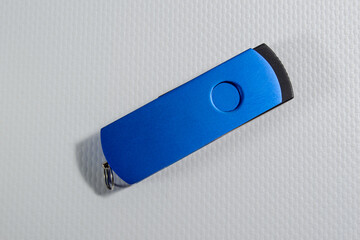 Bright blue USB drive isolated on white background