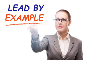 Businesswoman in lead by example concept
