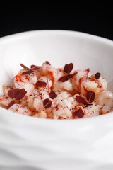 Fried shrimps served with plants in high cuisine manner