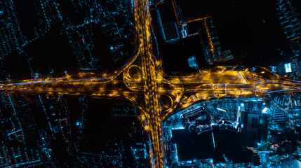 Aerial top view of Modern Multilevel Motorway Junction with Toll Highway, Road traffic an important...