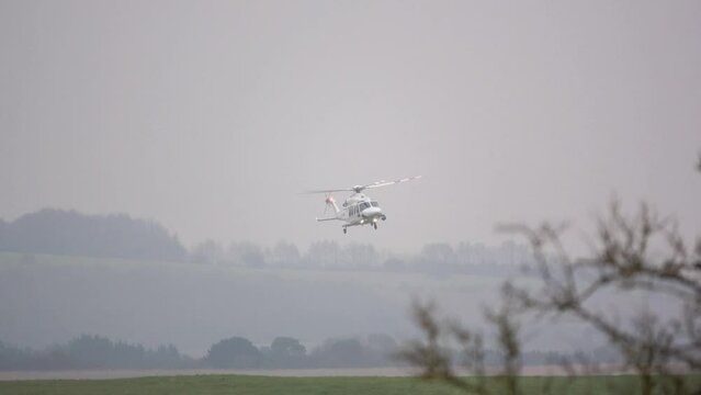 G-ETPP ETPS AgustaWestland AW139 large white helicopter flying low and banking hard