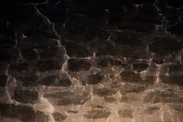 Texture of a stone wall. Old chimney wall textured background. Stone wall as background or texture....