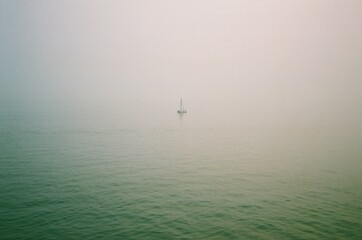 Fototapeta premium Boat in the smoke