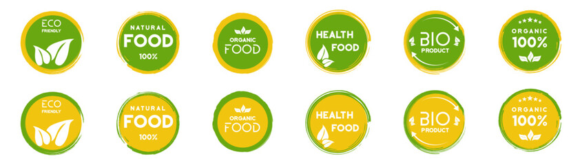 Set of grunge organic circles badges. Green and orange natural logo