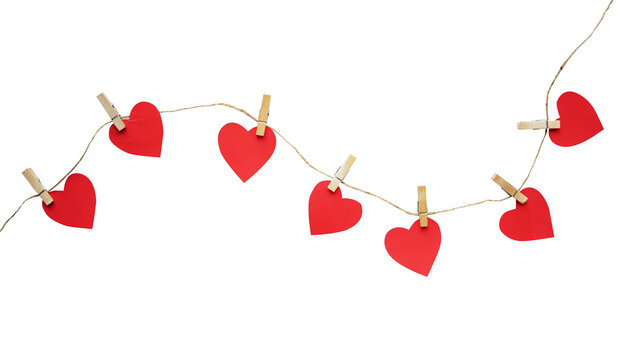 Heart shape paper clipped in rustic rope for romantic background and valentine decoration