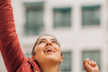 girl excited with joy on the street