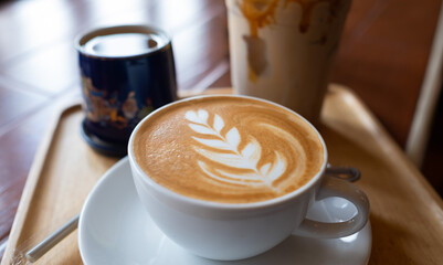 hot coffee cup on table at morning, relax time, latte coffee