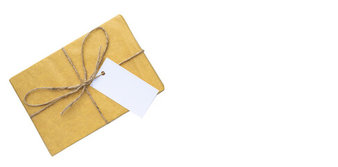 Vintage gift box with rope and blank card. Minimalist retro background and copy space