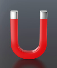Red horseshoe magnet on dark grey background