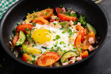 Ketogenic diet. Fried egg, ham and vegetables.  Keto breakfast. Brunch.