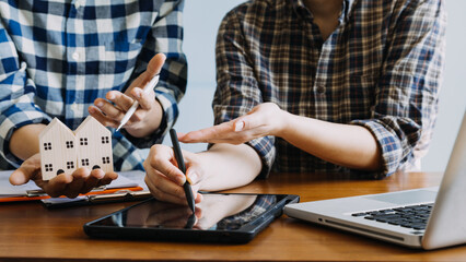 Signing home sales and insurance contracts with real estate agents, signing contracts to know the terms of buying and selling homes and real estate, contract signing ideas.