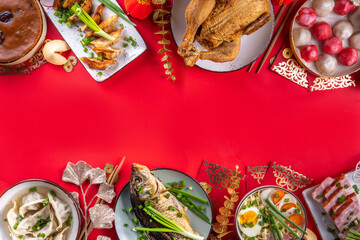 Fototapeta na wymiar Chinese lunar New Year dinner table