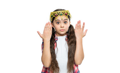 puzzled teen girl in crown at studio. teen girl in crown on background. photo of teen girl