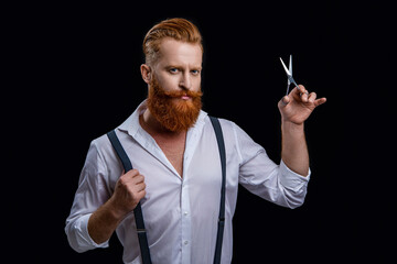 barbershop man isolated in black. barbershop man in studio. barbershop man with scissors.