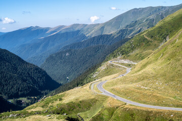 Fototapeta na wymiar Amazing panoramic summer view of the famous Transfagarasan serpentine mountain road between Transylvania and Muntenia in Romania