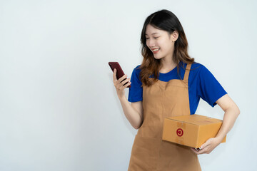 Asian woman holding smartphone and box on white background, online delivery and selling concept