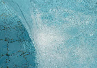 clear water jet with bubbles as background