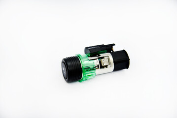 Cigarette lighter with green backlight. Spare part for the car. The electric cigarette lighter is disassembled.
