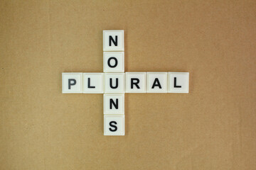 letters of the alphabet are crossed with nouns and plurals. English education concept