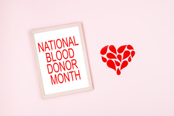 National Blood Donor Month background, web banner. Blood donor day campaign for donation charity concept with red drops heart and hands. Giving blood saves lives