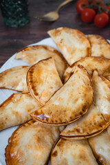 Homemade tuna, tomato and egg dumplings. Homemade and delicious Spanish tapas