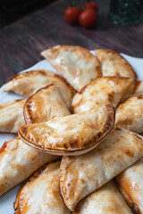 Homemade tuna, tomato and egg dumplings. Homemade and delicious Spanish tapas