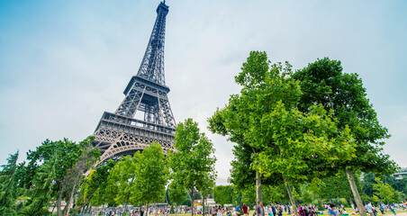 The Eiffel Tower and its magnificent gardens in summertime