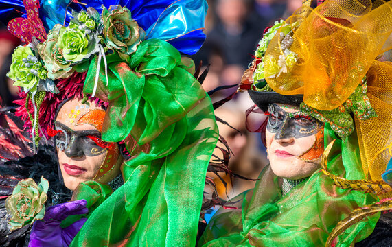 Venice, Italy - February 8th, 2015: People masquerading at the famous Venice Carnival