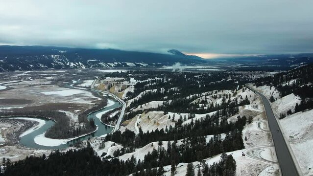 Aerial Riser Shot of Panoramic Scene of Spectacular Winter Landscape: View of Cariboo Highway 95 and Snow Covered Sand Banks Along Columbia Riverbanks