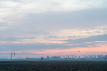 Sunrise over the fields, colourful sky