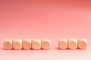 wooden blocks,on pink background, Group of blank wooden blocks, cubes copy space for business text background such as idea, goal, plan concept