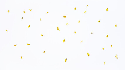 Abstract golden confetti particle pattern for luxury background