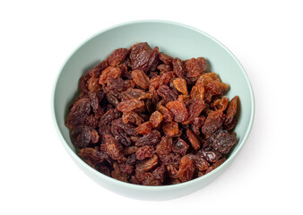Raisins in a plate on a white background.