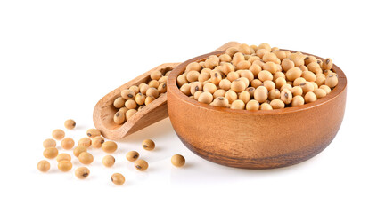 Dried soya beans in wooden container on white background.