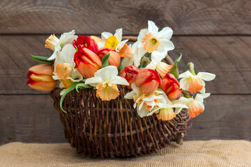 bouquet of spring flowers in a basket