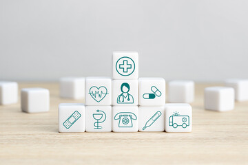 Health Insurance Concept. Pile of white blocks with healthcare medical icons. Copy space